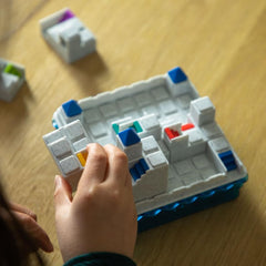SmartGames Atlantis Escape 3D stairway pieces adding dimensional puzzle-solving depth