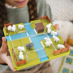 SmartGames Counting Sheep pieces ready for tactile play.