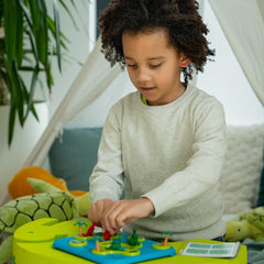 SmartGames Dinosaurs Mystic Islands storage case keeps components organized after play.