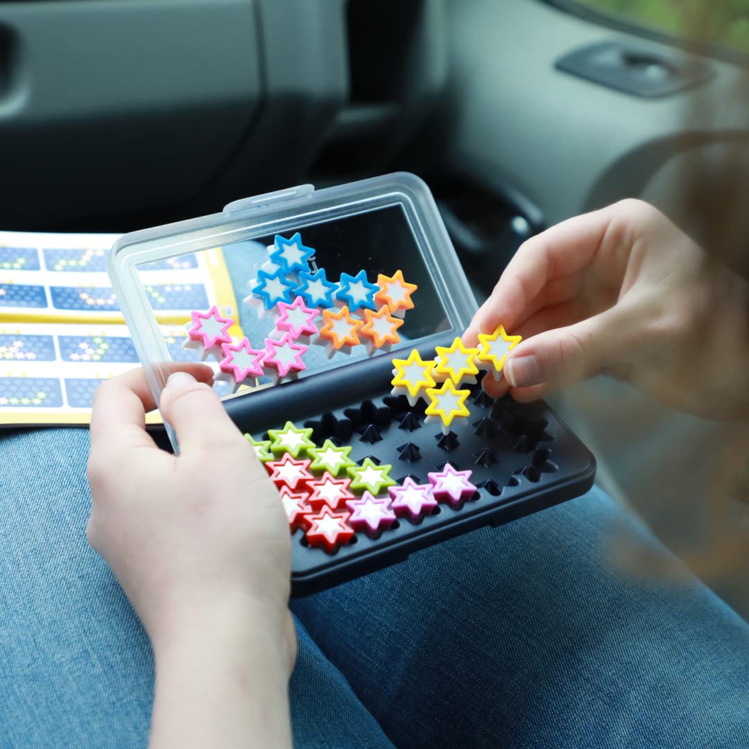 SmartGames IQ Stars challenge booklet guides players through levels.