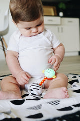 SmartNoggin NogginStik is an award-winning developmental toy for babies.