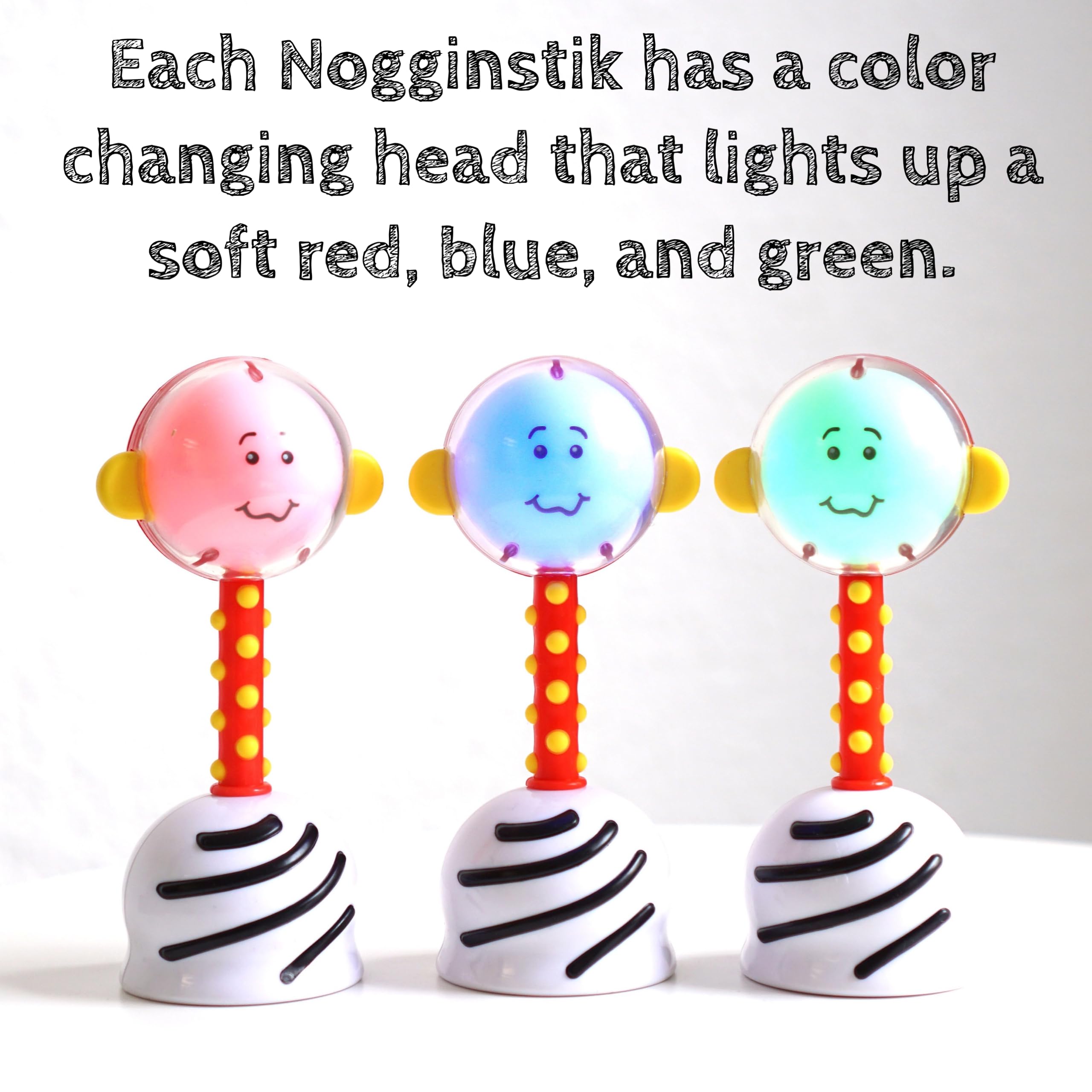 NogginStik textured grasp handle aids tiny hands during sensory play.