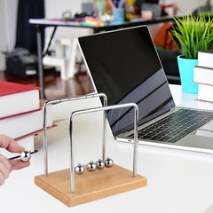 Smilesorg Newton's Cradle offers a calming focal point for stress relief at work