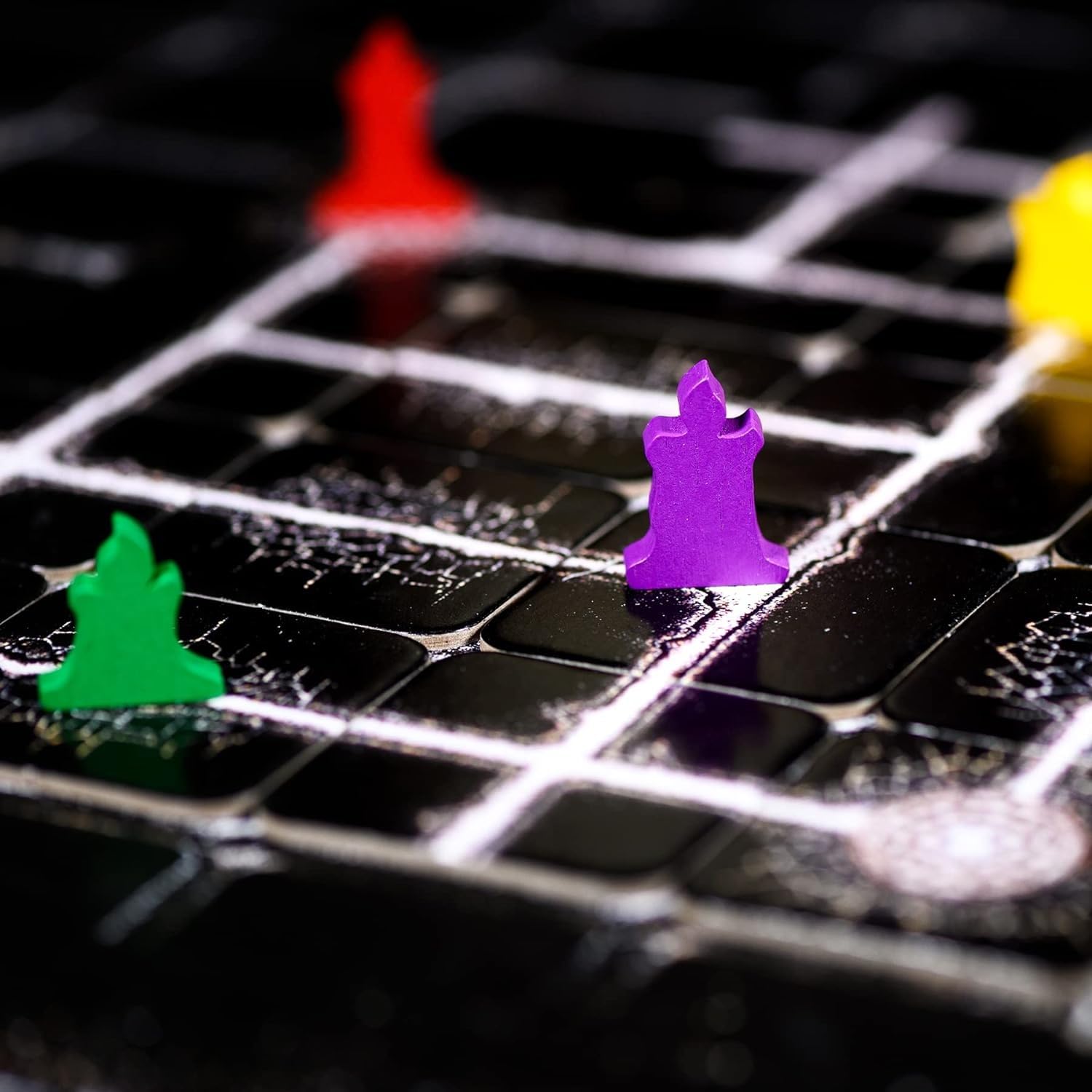 Smirk and Dagger The Night Cage candles reveal adjacent tiles, heightening tension.