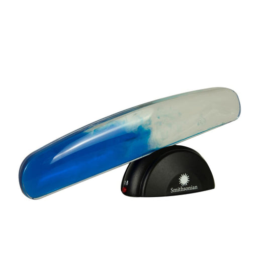 Smithsonian NSI Wave Machine Multi on a desk demonstrates wave motion and curiosity.