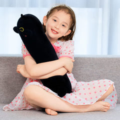 SNOWOLF Black Cat Plush on sofa adds a cute décor accent
