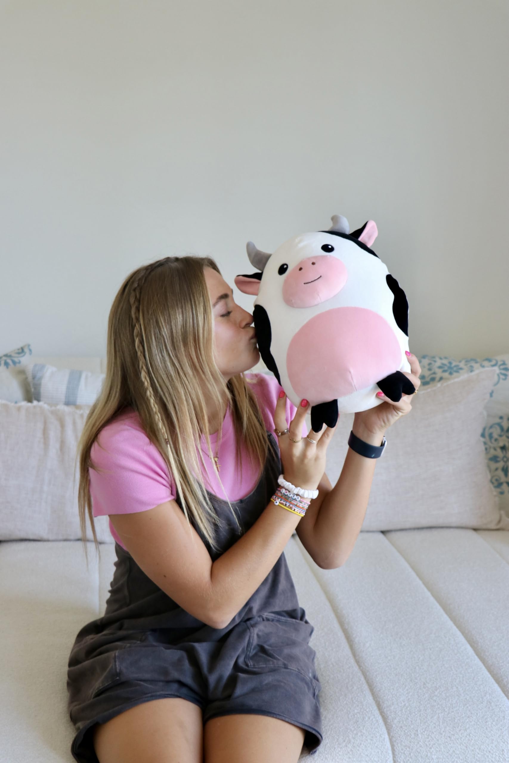 Snuggaboos Daisy the Cow Squish texture closeup, highlights plush softness.