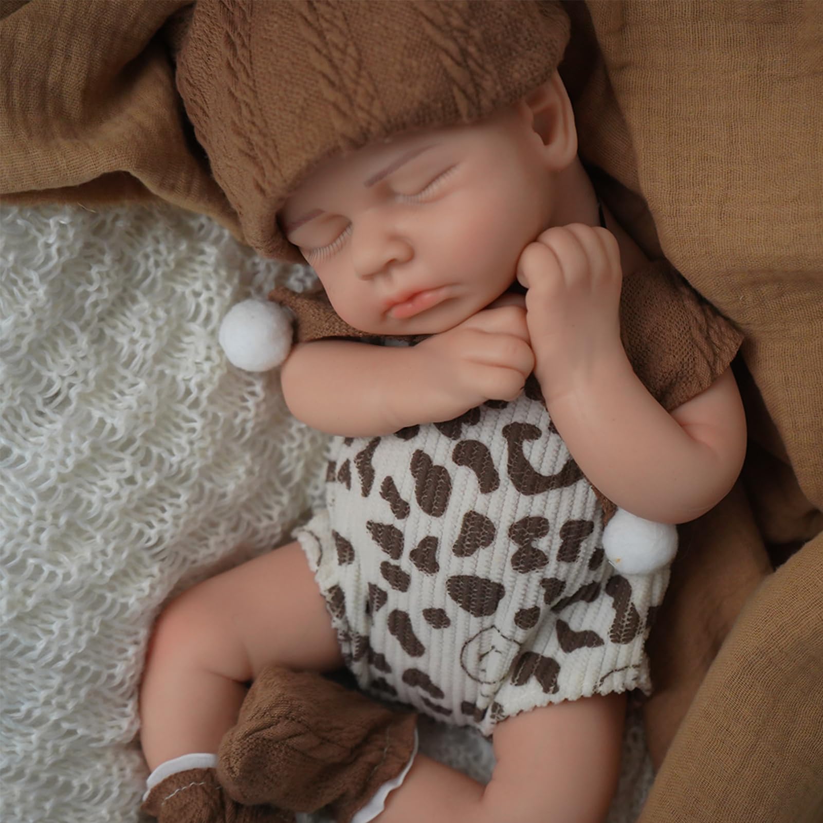 SOFTMARY lifelike reborn doll face shows realistic skin texture for imaginative play