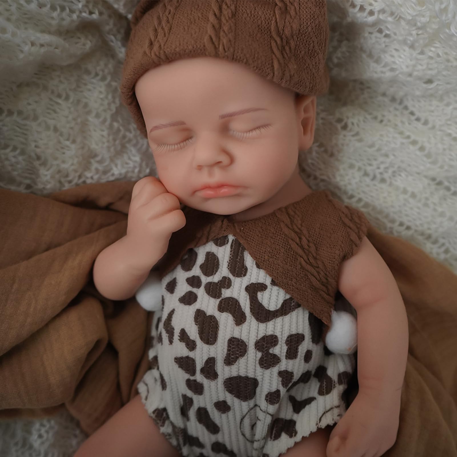 SOFTMARY lifelike reborn doll silicone body offers newborn-like softness and poseable limbs