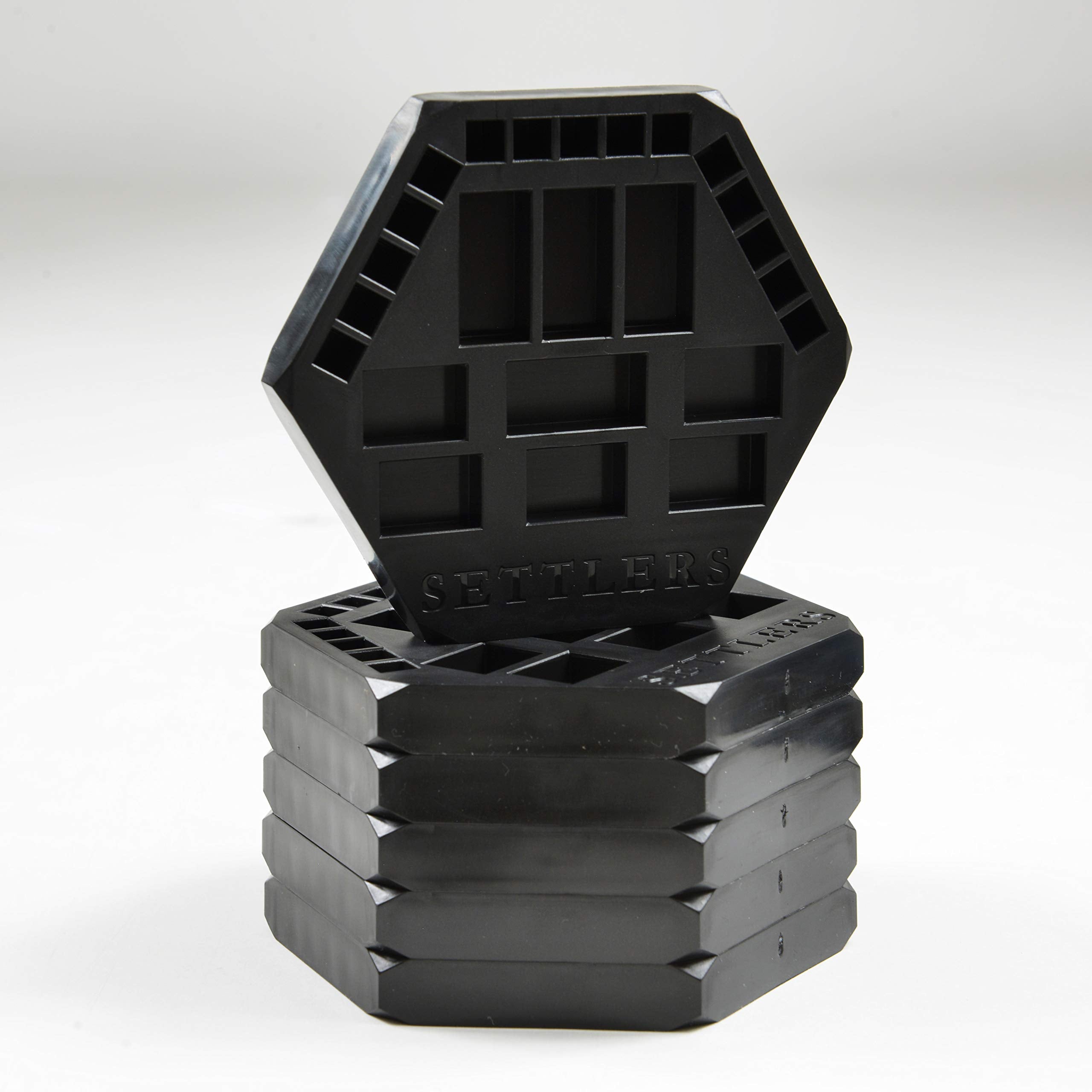Solid Factory Settlers six-pack storage keeps game pieces organized for travel or game nights.