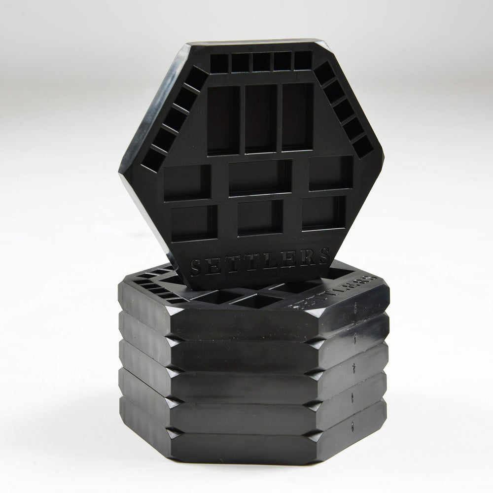 Solid Factory Settlers six-pack storage keeps game pieces organized for travel or game nights.