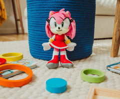 Amy Rose plush red dress detail highlights iconic look for display.