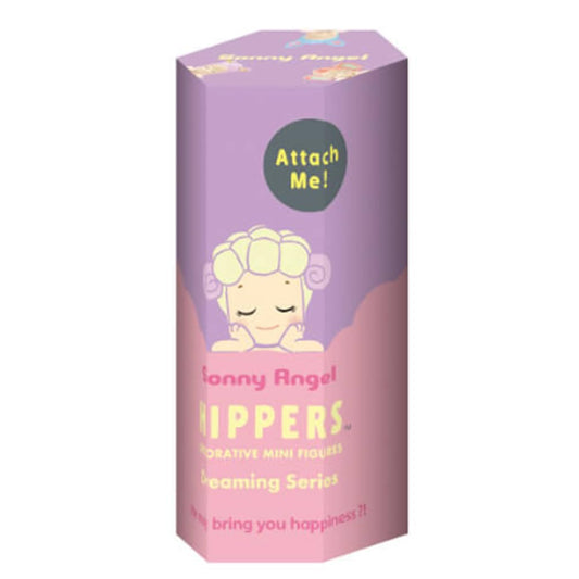 Sonny Angel Dreaming Series Hipper mini figure perched on a desk, adding a cheerful touch.