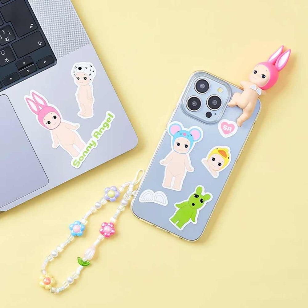 SONNY ANGEL Secret holographic stickers add shimmering accents to laptops and bottles.