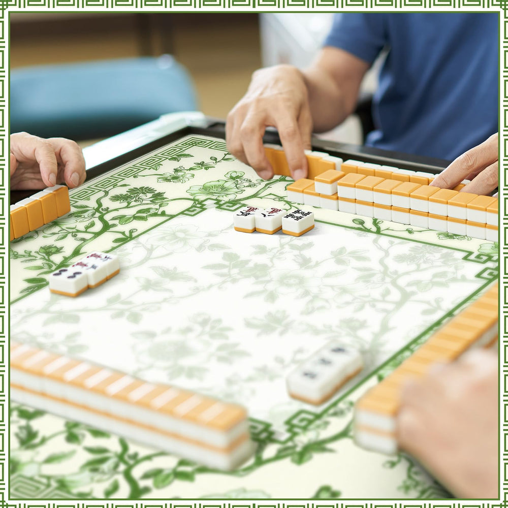Sonwyoung chinoiserie mahjong mat green white design inspires calm play.