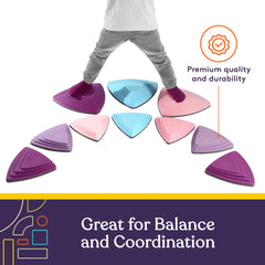 Stepping stones with varied heights to challenge growing balance skills.