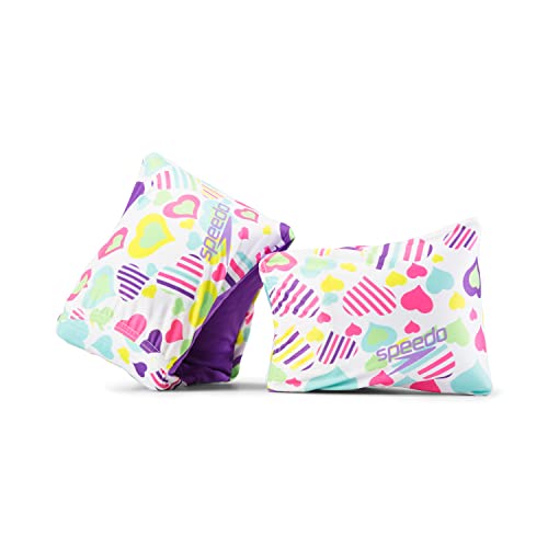 Speedo arm bands worn by child during pool practice to build water confidence.