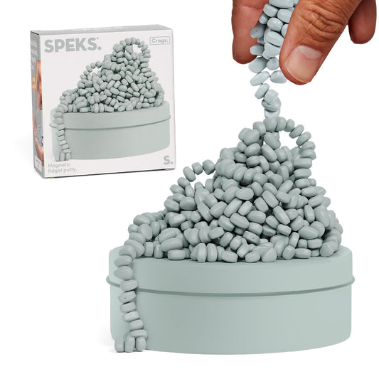 Speks Crags ferrite putty in a metal tin with 500+ stones for desk stress relief.