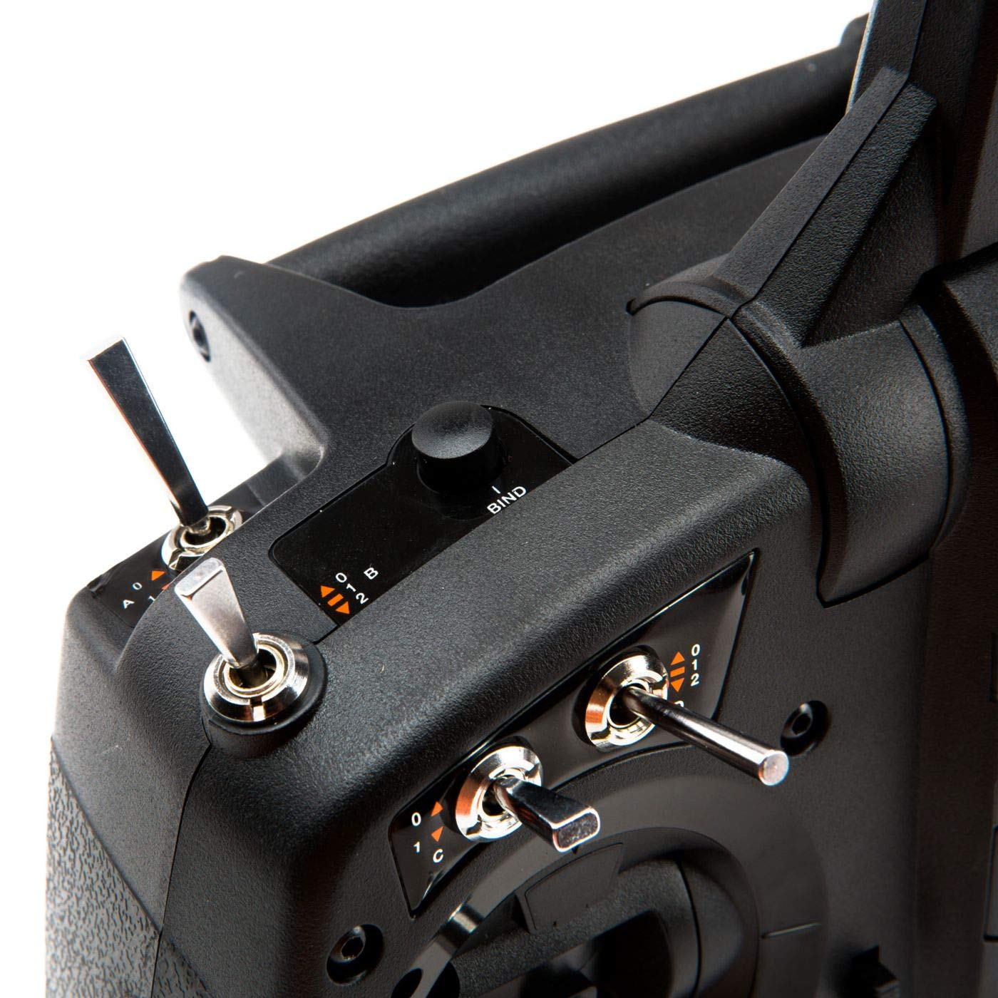 Spektrum DX6e joystick close-up shows smooth precision.
