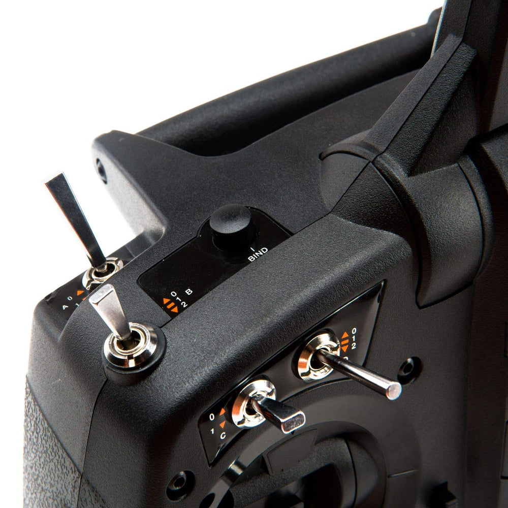 Spektrum DX6e joystick close-up shows smooth precision.