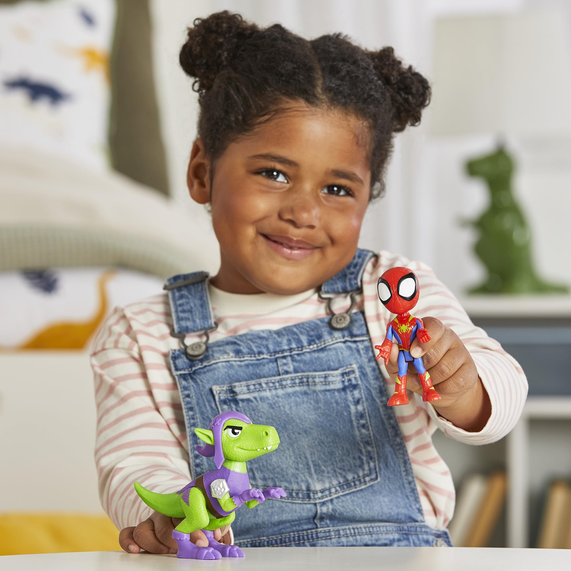 Collectible Spidey and Goblin Raptor figures encourage ongoing play and collection.