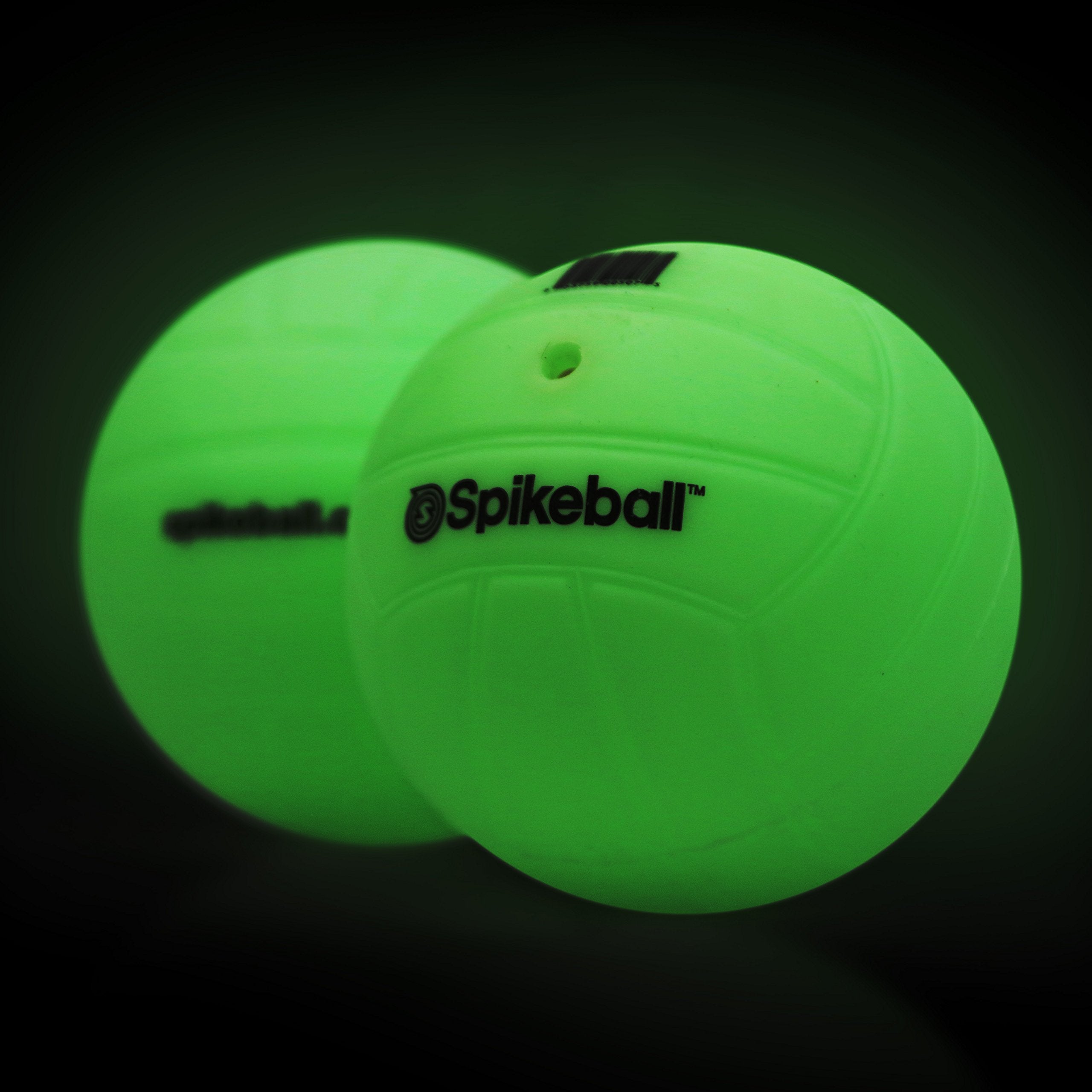 Spikeball glow balls illuminate night games for quick ball tracking.