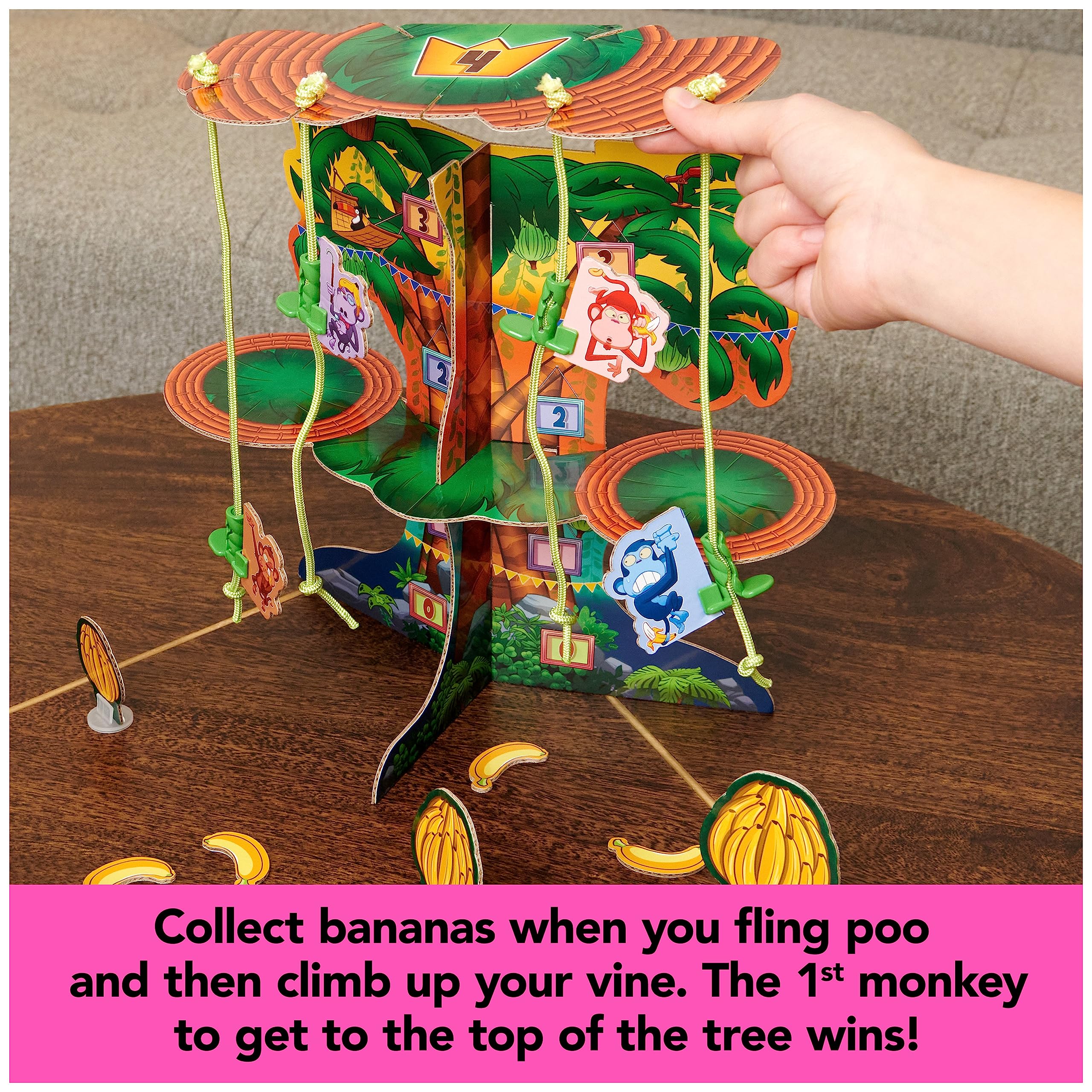 Spin Master Monkey See Monkey Poo banana bunch clips for token collection moments.