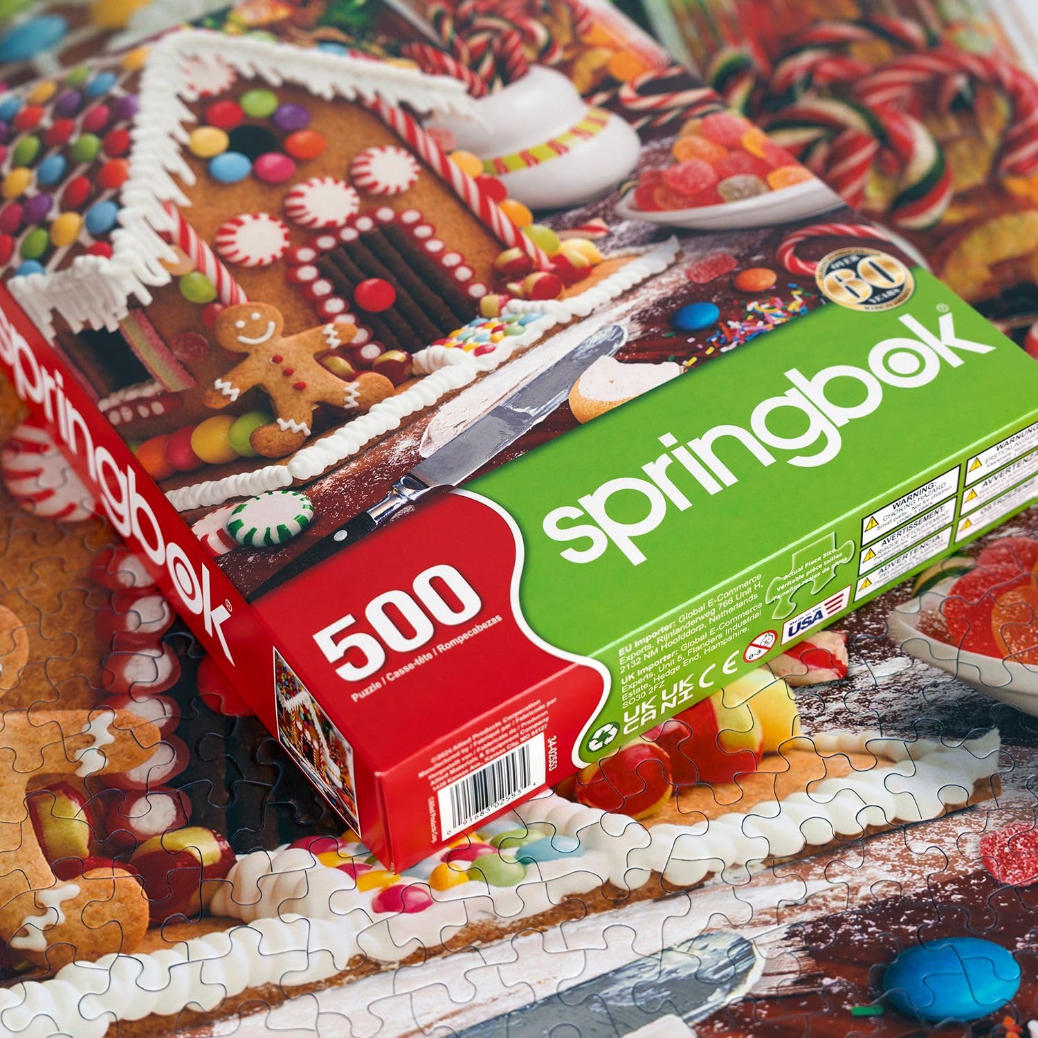 Springbok Gingerbread House scene featuring candy canes and gumdrops