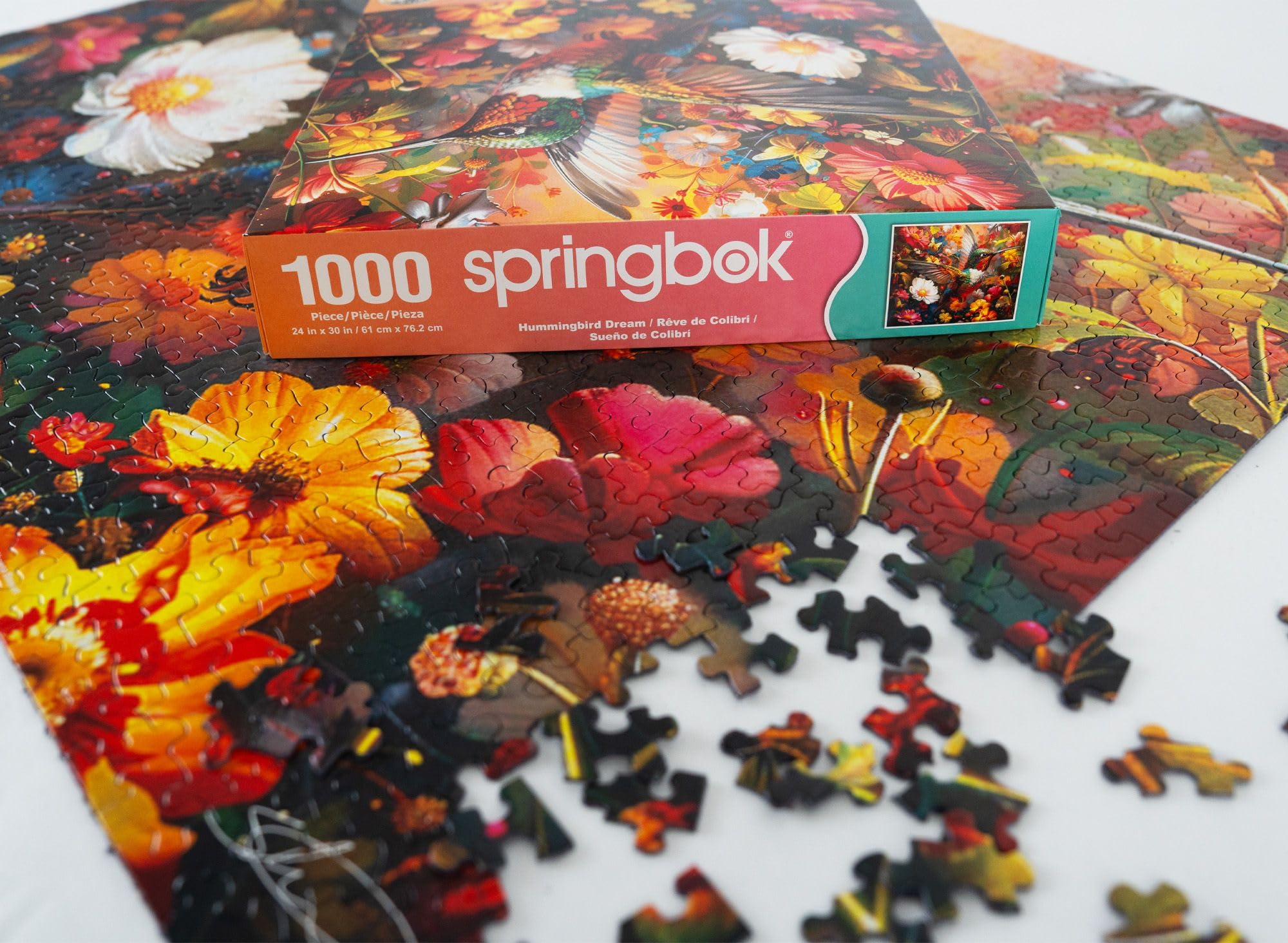 Springbok Hummingbird Dream 1000-piece puzzle offers a satisfying, shareable pastime for adults.