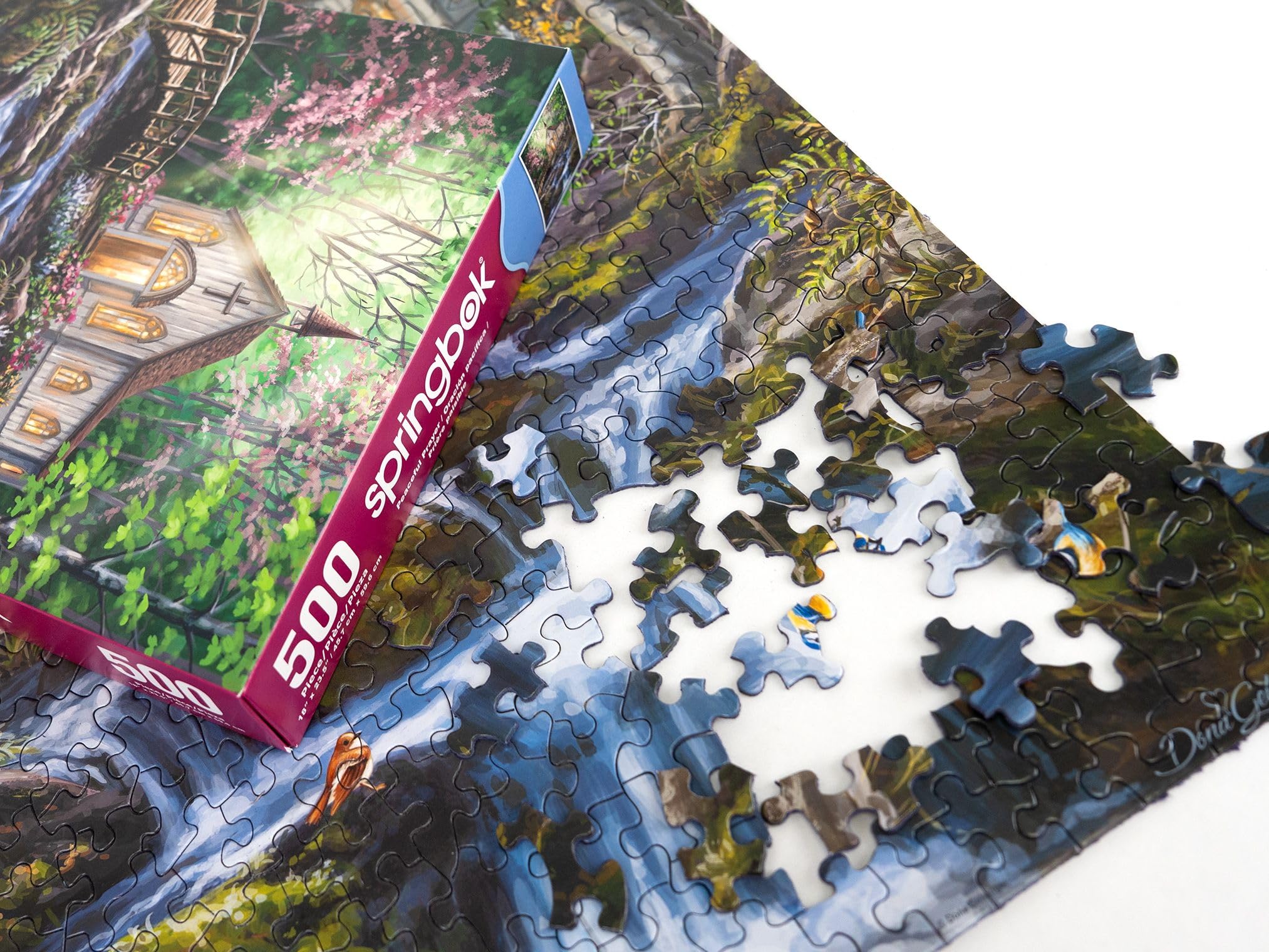 Springbok Peaceful Prayer birds by water scene adds gentle ambiance for unwinding.