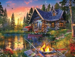 Springbok Sun Kissed Cabin puzzle cover: serene lakeside fishing cabin for relaxing evenings