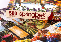 Springbok Vineyard View candlelight scene enhances ambiance during puzzle time.