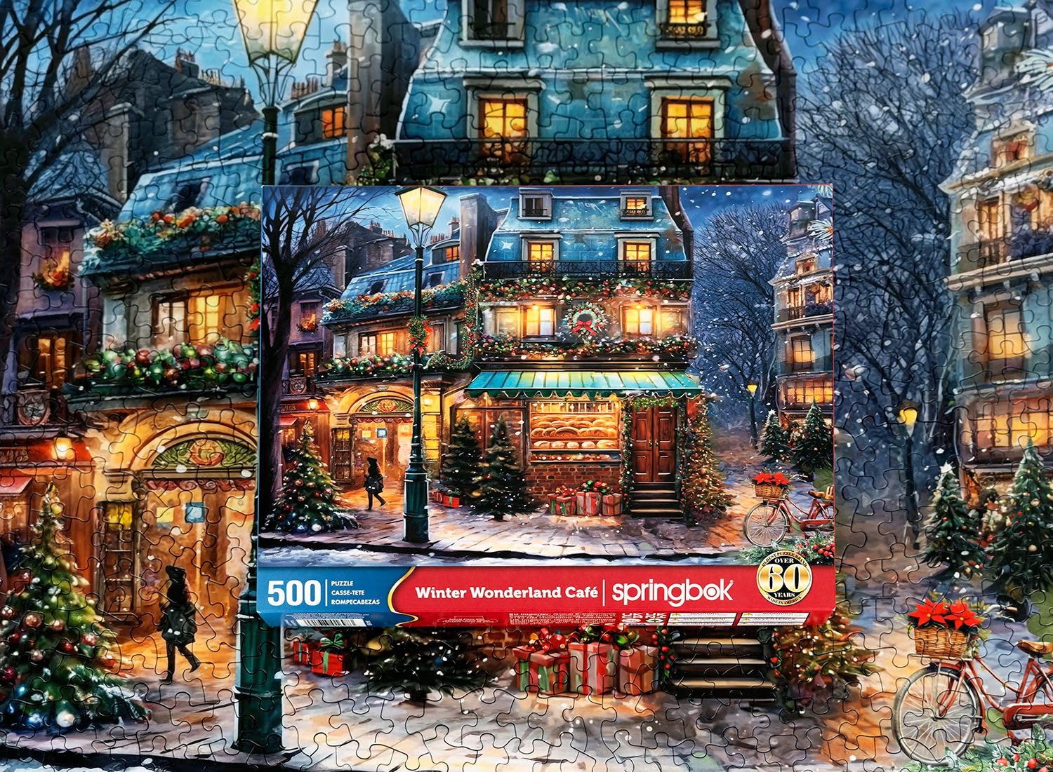 Springbok Winter Wonderland Cafe puzzle town image depicts a snow-covered street and pedestrians.