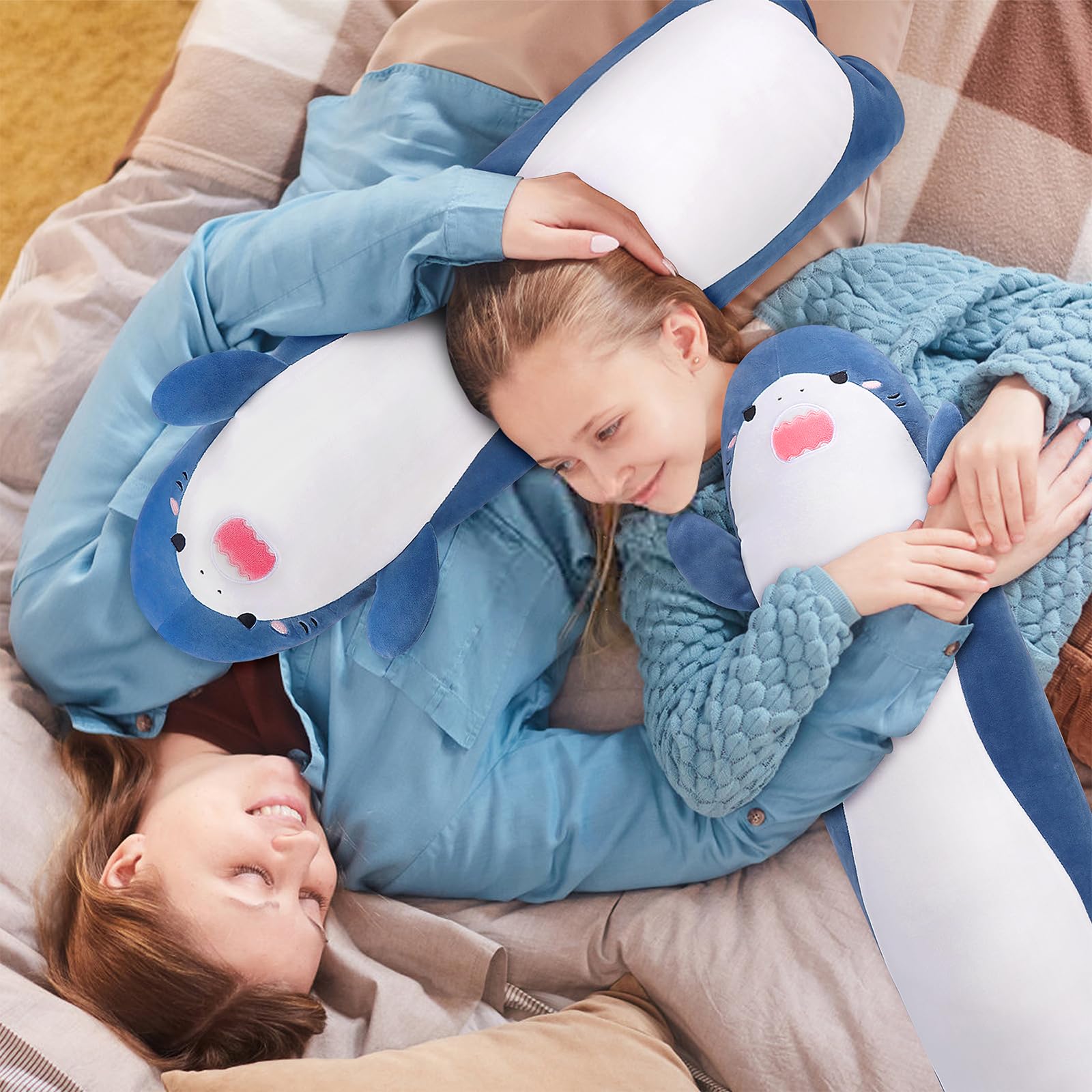 Sprinqdawin shark plush in a hugging pose, cozy companionship.
