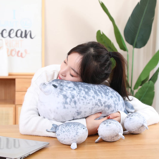 SQEQE Chubby Seal Pillow Plush with four baby seals removable encourages imaginative storytelling.
