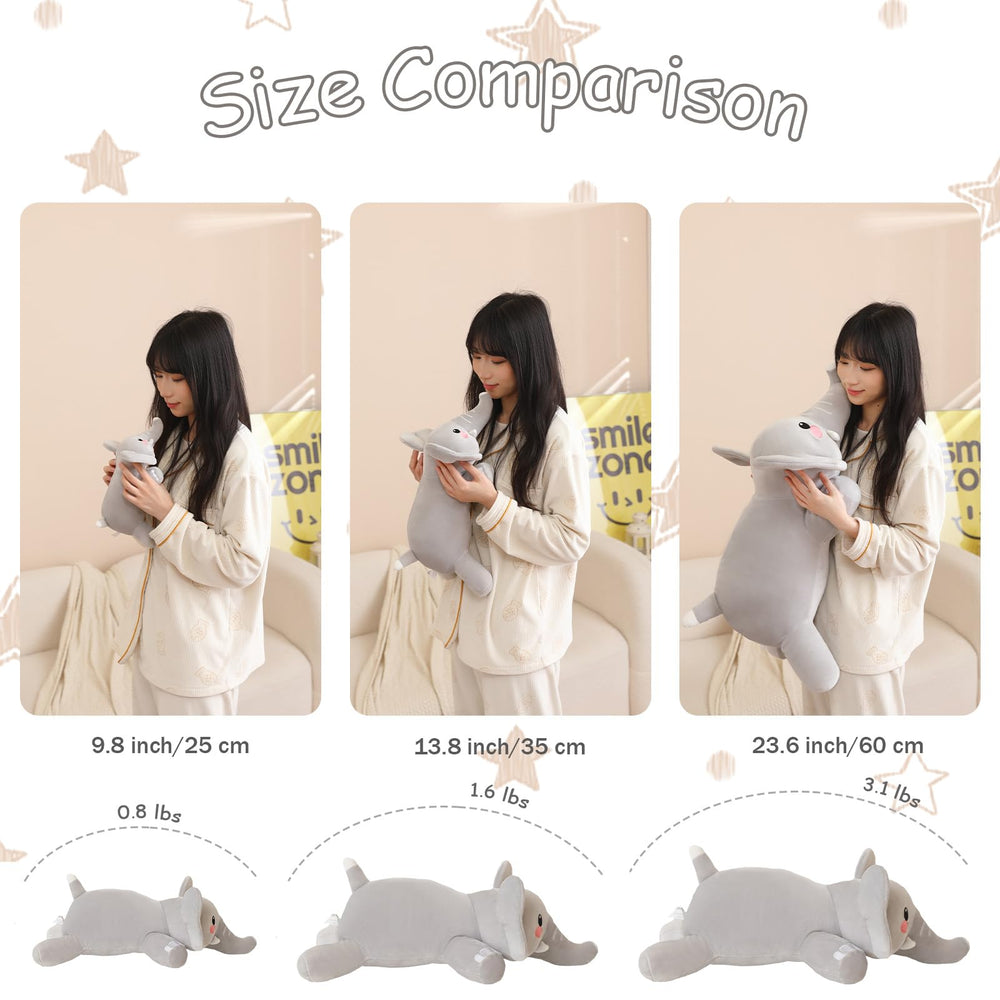 SQEQE weighted elephant plush on bed—decorative yet functional.