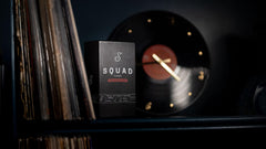 Squad Cards party-scene shows a large group enjoying a lively game.