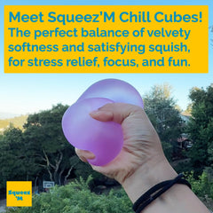 Squeez'M Chill Cube on a clean desk setup for distraction-free work.