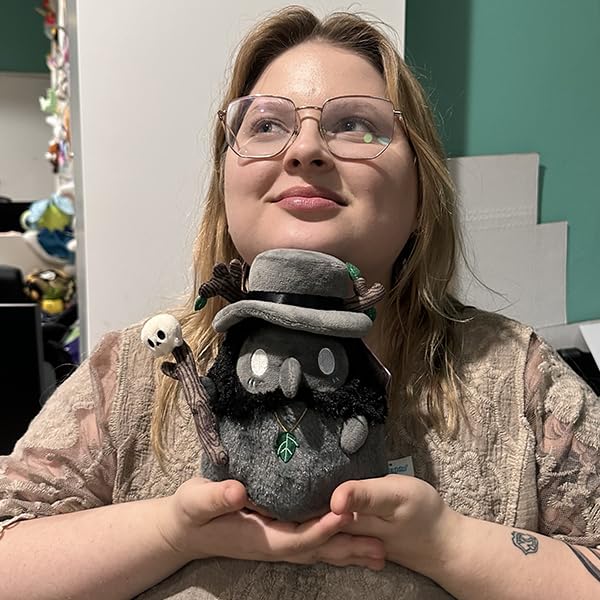 Squishable Druid Plague Doctor close-up reveals soft fur and inviting texture for cuddling.