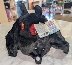 Close-up fur texture of Squishable Mini Baby Mothman, plush and cozy