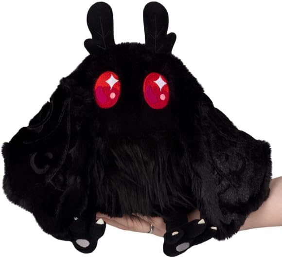 Wing magnets on Squishable Mini Baby Mothman show pose options