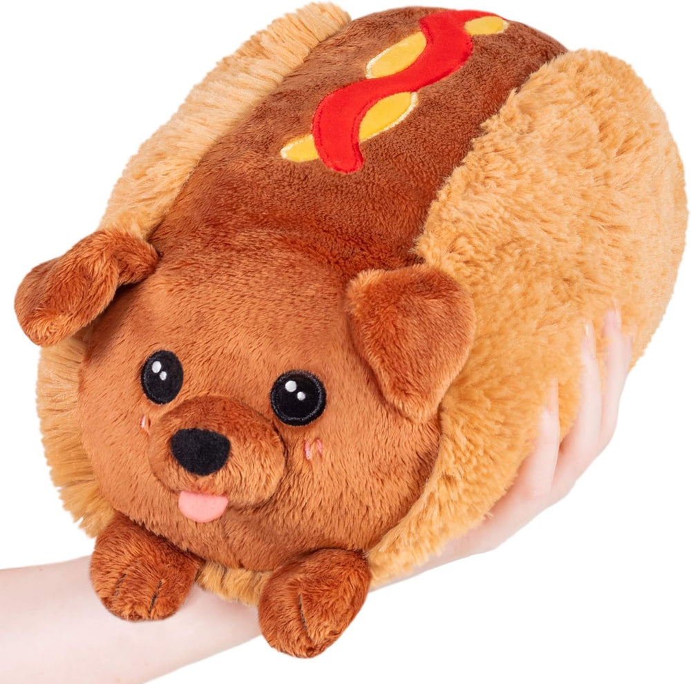 Squishable Mini Dachshund Hot Dog on desk, cozy snuggle buddy
