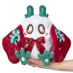 Squishable Mini Mistletoe Baby Mothman overhead kiss pose, cozy desk companion.