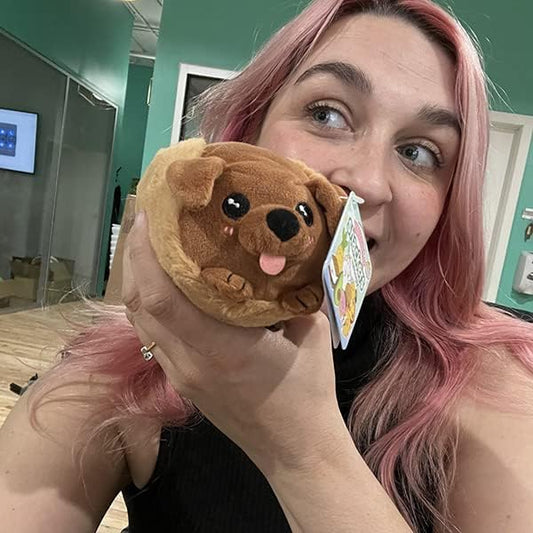 Squishable Snugglemi Snackers Dachshund Hot Dog close-up, bean-weighted base offers cozy handheld feel.