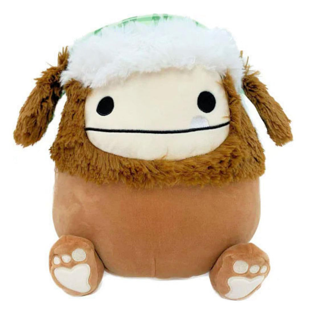 Squishmallows Benny the Bigfoot in a trapper hat, cozy cuddle buddy for kids.