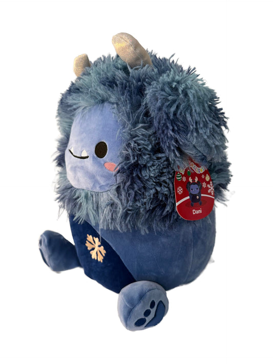 Squishmallows Dani Dark Blue Bigfoot 12-inch side view for cuddly companionship.