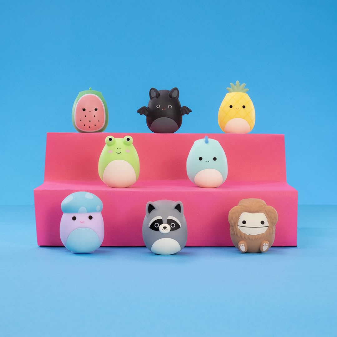 Squishmallows FigBand Ben Teal Dino playful teal figure for desk display.