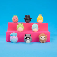 Squishmallows FigBand Ben Teal Dino playful teal figure for desk display.