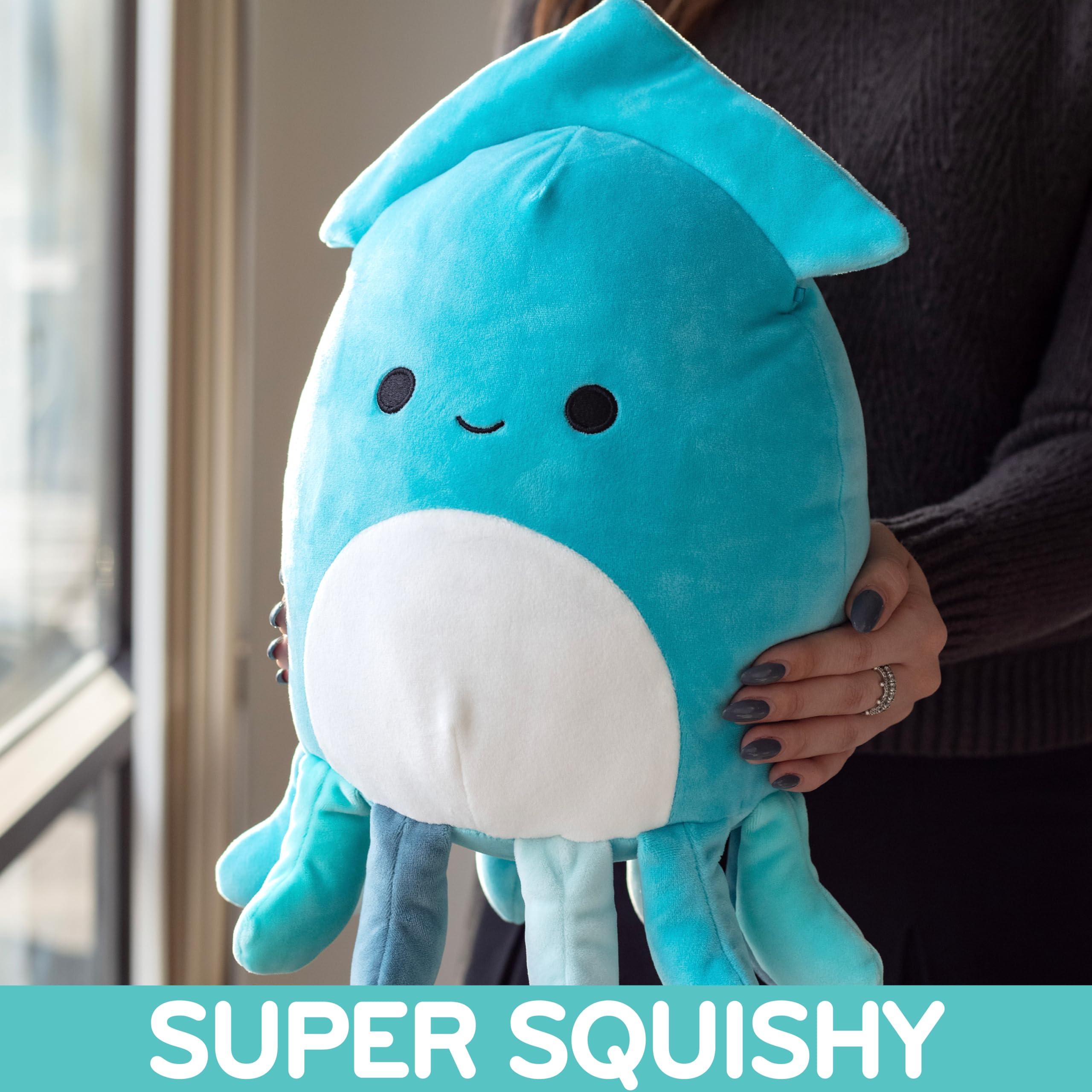 Detail shot of Sky's durable stitching on the Christmas Squid plush.