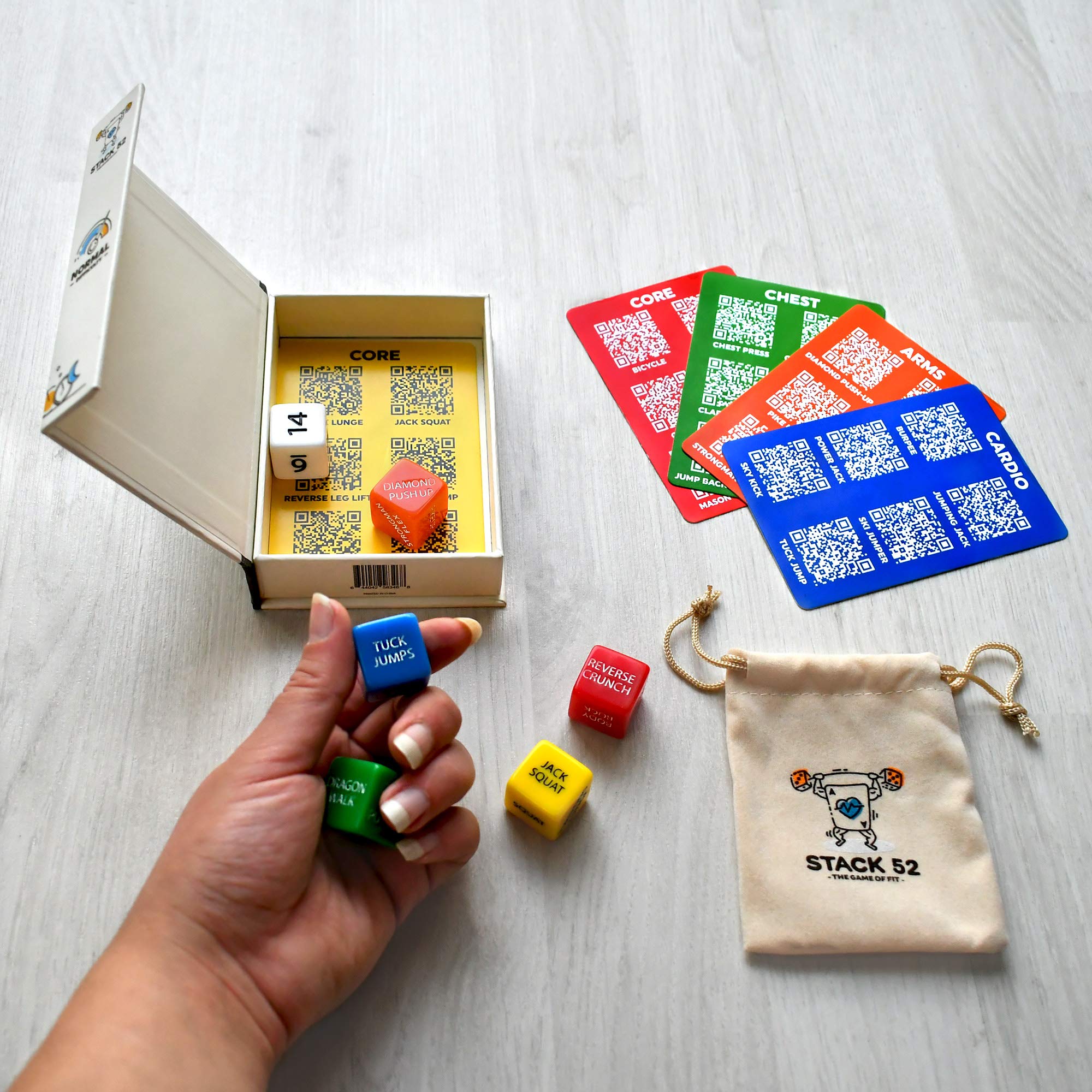 Stack 52 Quick Sweat Dice used in a compact home workout space